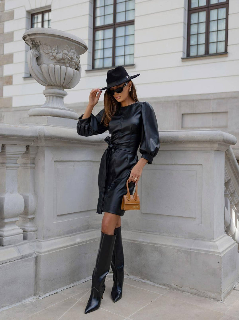 BLACK FAUX LEATHER SKIRT WITH BELL SLEEVES AND A BELT