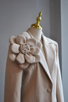 LIGHT BEIGE SPRING COAT WITH A FLOWER