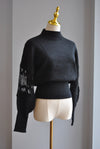 BLACK SWEATER TOP WITH THE STATEMENT LACE SLEEVES