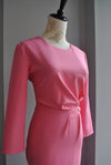 PINK MIDI DRESS WITH SIDE RUSHING AND A PIN