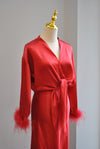 RED SILKY SET OD MIDI SKIRT AND A WRAP TOP WITH FEATHERS