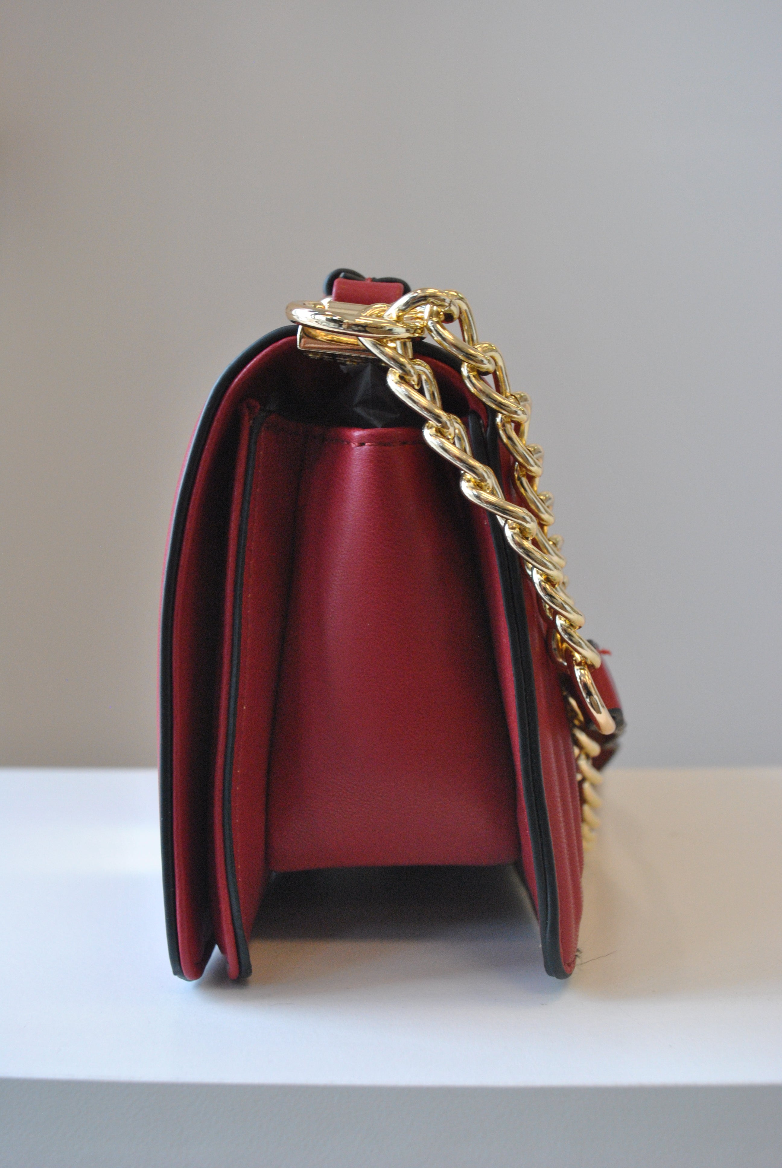 Red purse with gold chain on sale